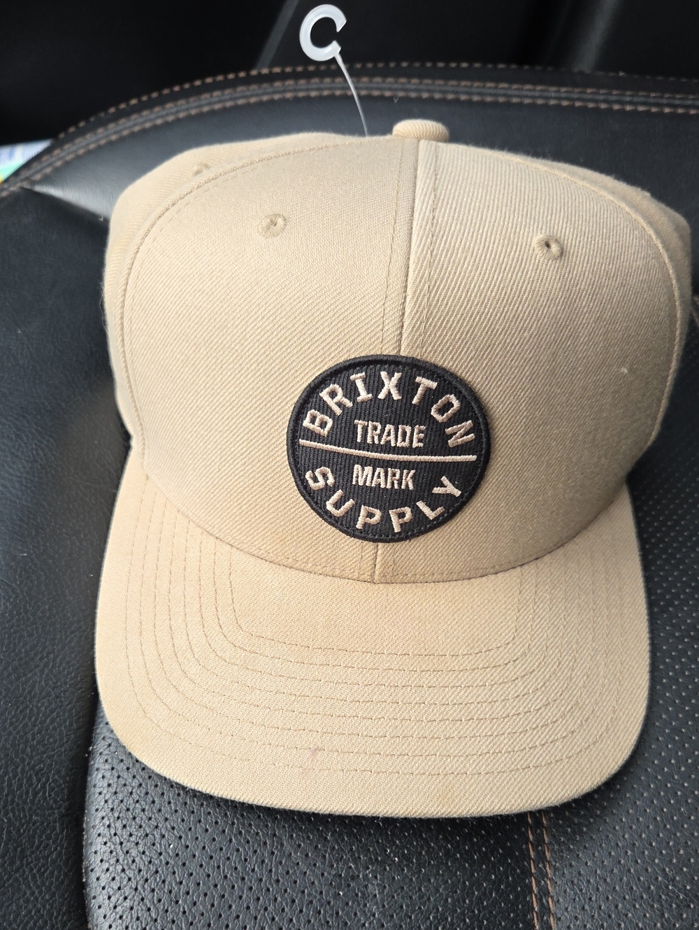 Brixton flat peak cap in NWOT condition